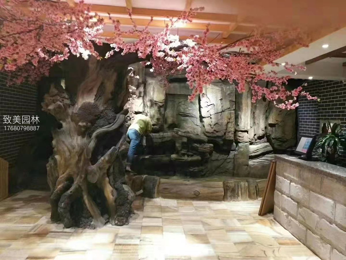 假山制作水泥仿真树桃花树施工